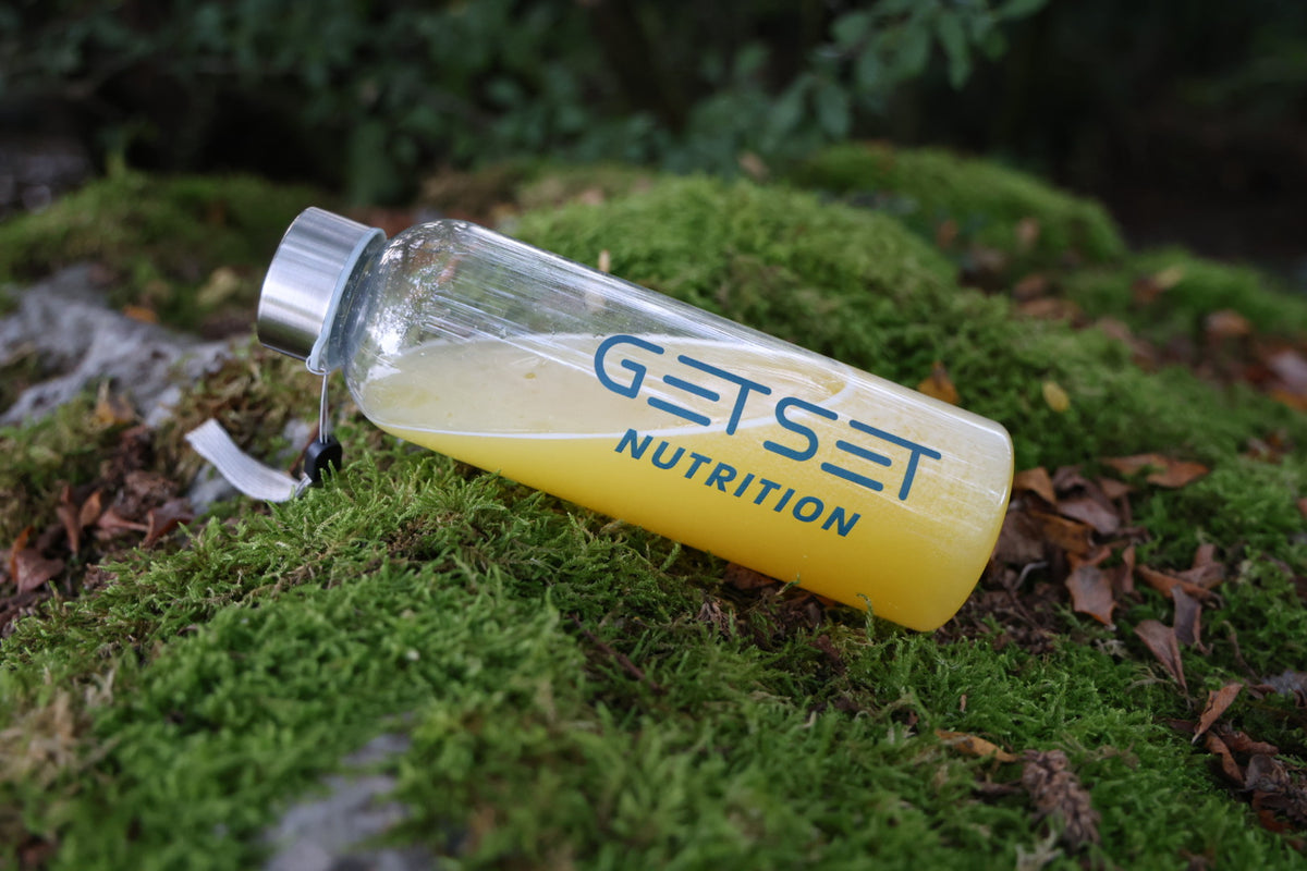 GETSET Nutrition water bottle on moss